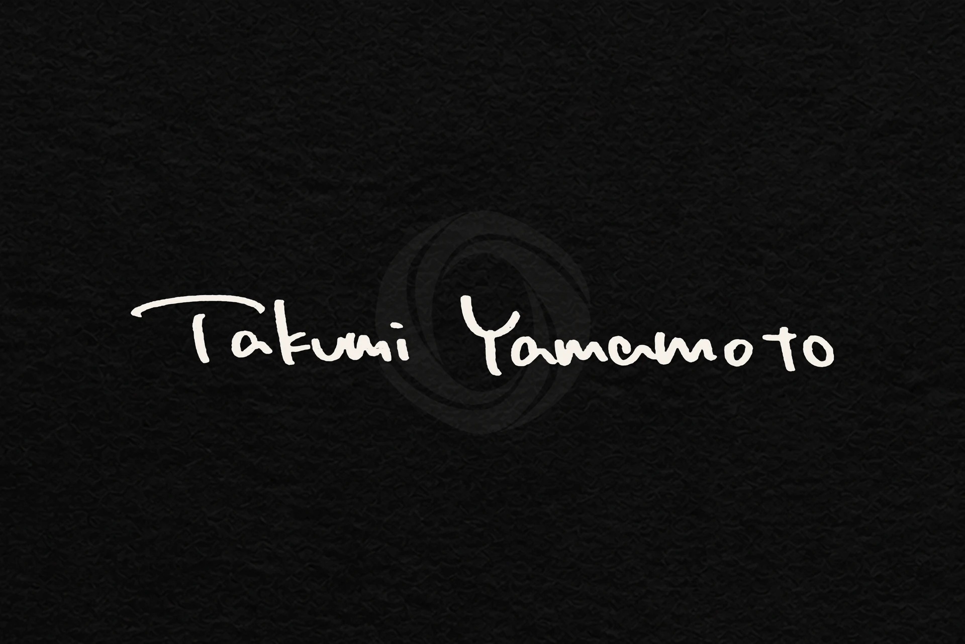 Takumi Yamamotoのサインを重ねたStudio MASSのロゴ